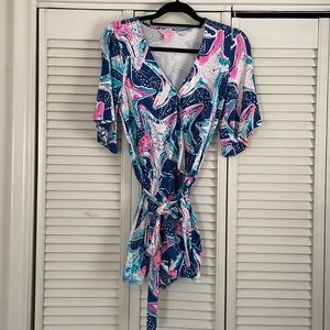 Adorable Lilly Pulitzer short romper. Small stain showed in pictures.